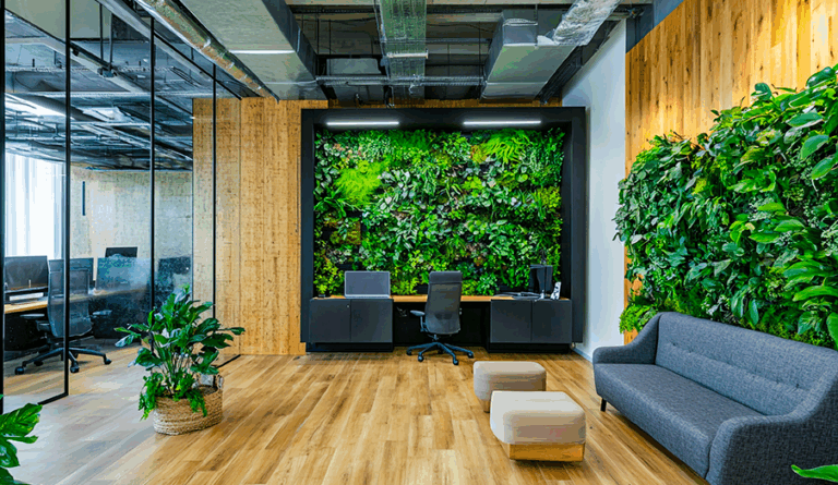 Sleek modern office reception area featuring living green walls, natural wood accents, and floor-to-ceiling windows overlooking Dubai's skyline)